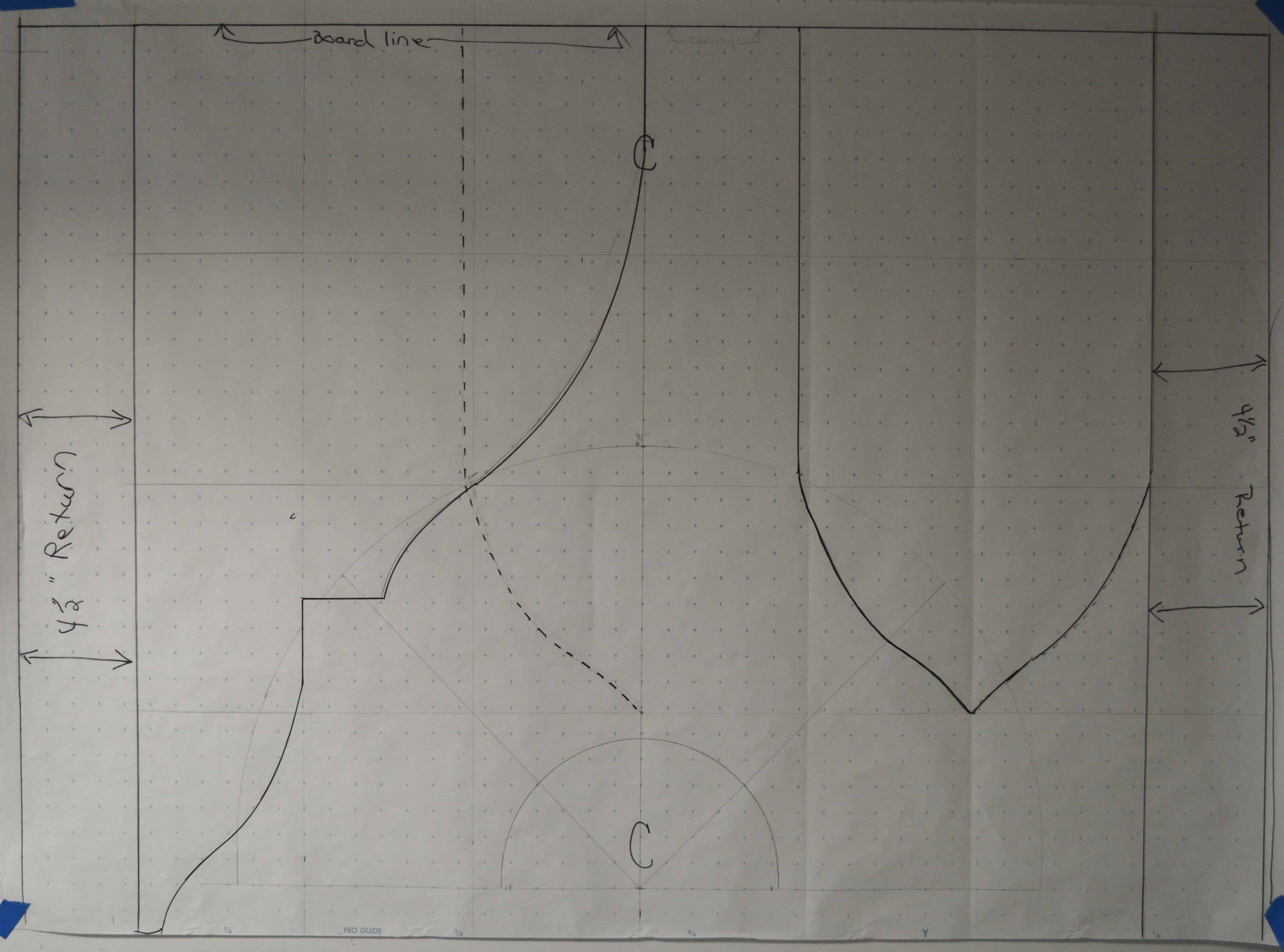 First the client's window is drawn to scale on graph paper. Then full size pattern pieces are drawn on the paper creating the long and short points for proper scale and proportion. Hanging the pattern on the wall helps to visualize the final outcome prior to cutting the fabric and fabricating the custom window valance.