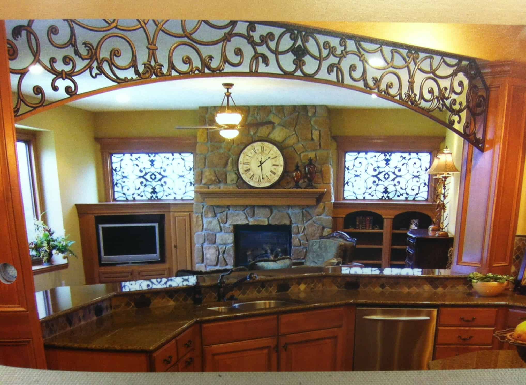 I love the use of Tableaux as an architectural element between this kitchen and keeping room.