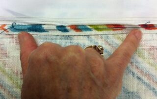An interlock stitch in drapery panel