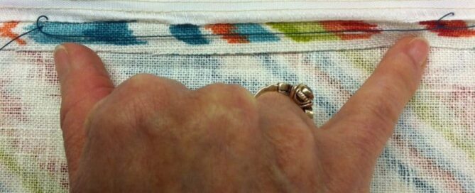 An interlock stitch in drapery panel