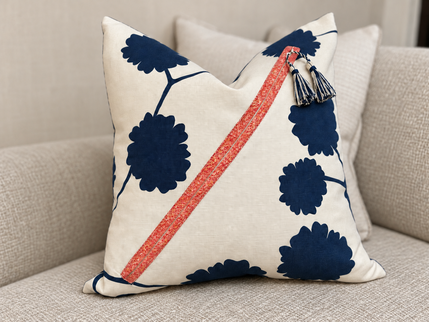 Coral-bound diagonal seam on floral pillow Coral-bound diagonal seam on floral pillow