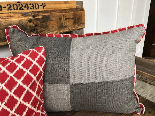 Color blocked pillow with contrast flat flange detail around the edges