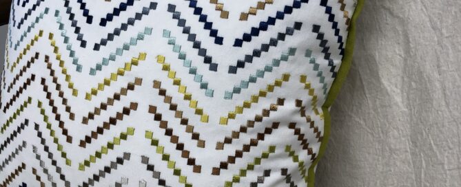 In pillow making, pillows with the 'dog ears' removed will create a pillow with tapered corners, but still with an overall square appearance.