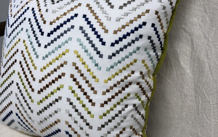 In pillow making, pillows with the 'dog ears' removed will create a pillow with tapered corners, but still with an overall square appearance.