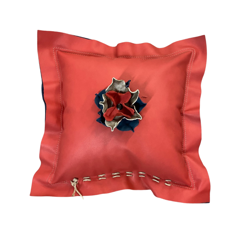 leather flanged pillow with a flower